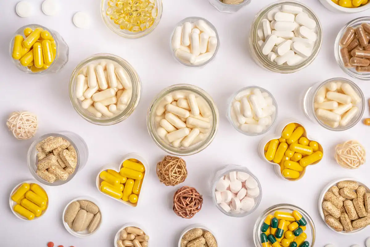 different kinds of weight loss supplements on a table and on a container for each kind