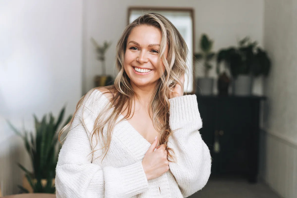 woman holding her healthy hair